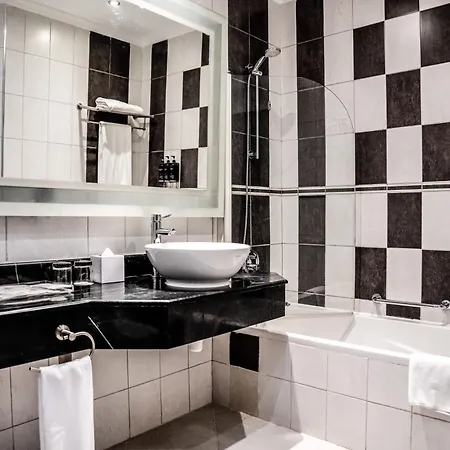 Millennium Central Doha Room photo